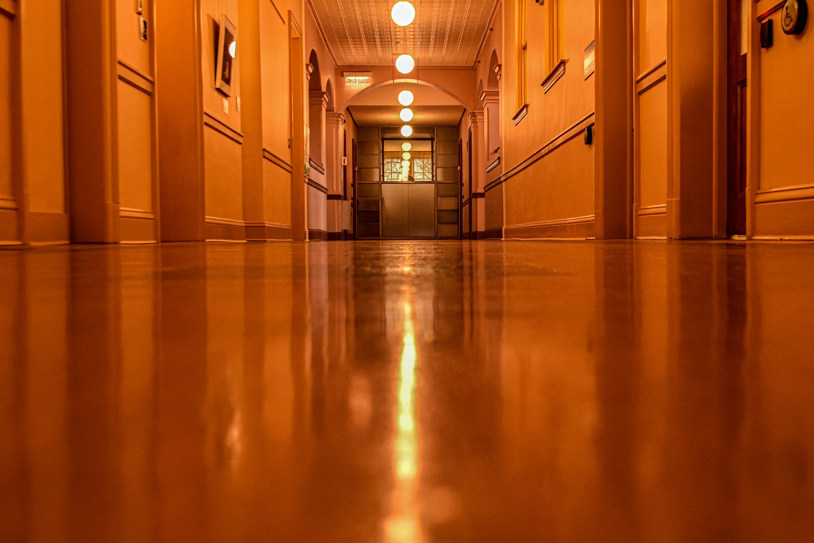 hall way with warm-coloured lights